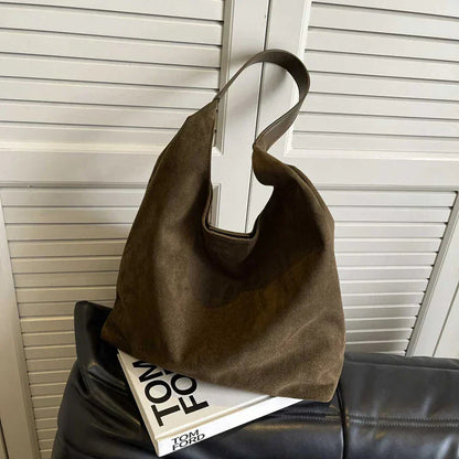 Bolso de ante con asa